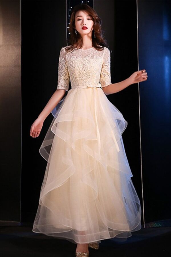 Half-Sleeve Lace Top, Belted Waist, Flowing Ruffle Skirt