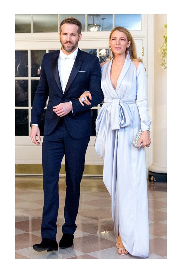 Silver Serenity – State Dinner–Inspired Silver Satin Draped V-Neck Wrap Gown