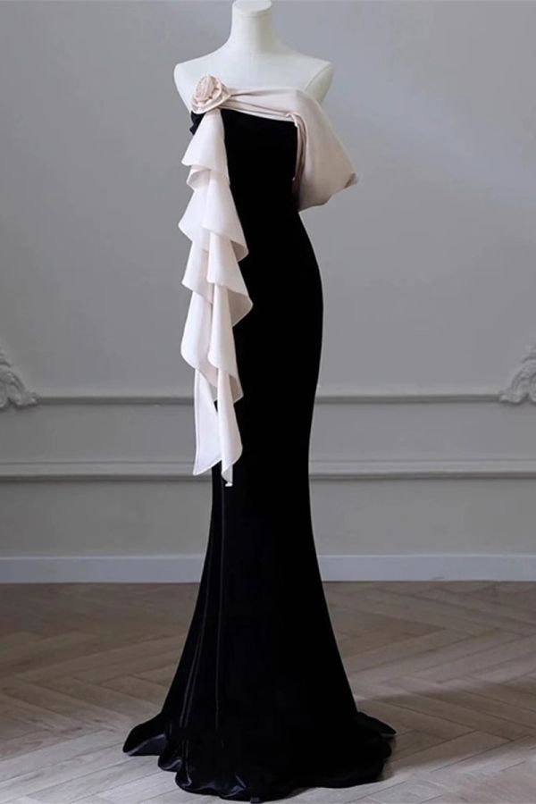Elegant Off-Shoulder Black and Blush Evening Gown with Ruffled Silk Overlay and Floral Accent