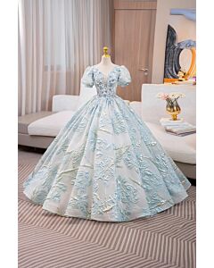 Aurora Dream – Shimmer Blue Ball Gown with Floral Texture and Sheer Details