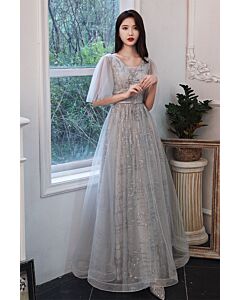 Soft V-neck, sheer tulle butterfly sleeves, sequin-embroidered bodice, and flowing A-line floor-length skirt