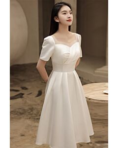 Ivory Short-Sleeve Tea-Length Dress with Sheer Neckline – Perfect for Receptions and Semi-Formal Events