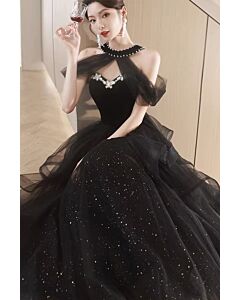 Enchanting Black Halter Velvet and Tulle Gown with Sparkling Embellishments – Perfect for Red Carpet Galas