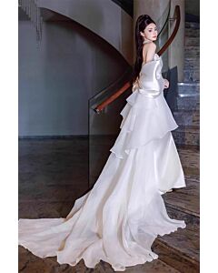 White Off-Shoulder Bridal Gown with Dramatic Puff Sleeves and Tiered Train – Perfect for Fairytale Weddings