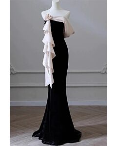 Elegant Off-Shoulder Black and Blush Evening Gown with Ruffled Silk Overlay and Floral Accent