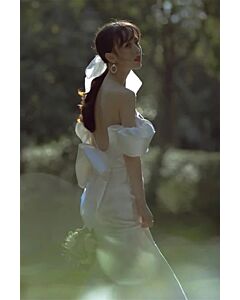 Ivory Puff-Sleeve Open-Back Bridal Gown with Bow – Perfect for Weddings