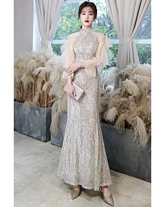 Elegant Silver Sequin Evening Gown with Sheer Sleeves – Perfect for Glamorous Occasions