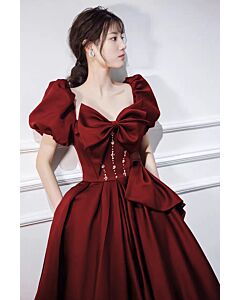 Elegant Red Off-Shoulder Gown with Bow and Crystal Detailing