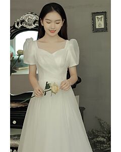 Graceful Ivory Puff-Sleeve Gown – Elegant A-Line Dress with Delicate Shoulder Straps