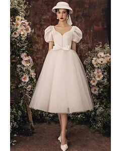 Vintage Blossom Tea-Length Dress – Puff Sleeves & Bow Detail