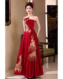 Elegant Red Embroidered Evening Gown with Asymmetrical Design and Fringed Accents