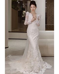 Timeless Lace Long-Sleeve Wedding Gown with Elegant Train and Delicate Detail