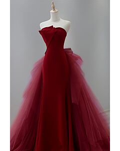 Romantic Red Strapless Gown with Flowing Tulle Accents