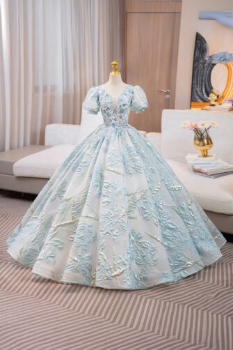 Aurora Dream – Shimmer Blue Ball Gown with Floral Texture and Sheer Details