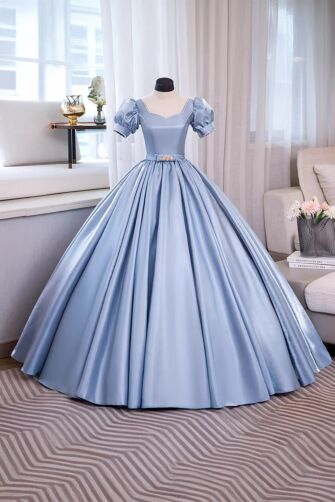 Celestial Grace – Light Blue Satin Gown with Puff Sleeves and Waist Jewel