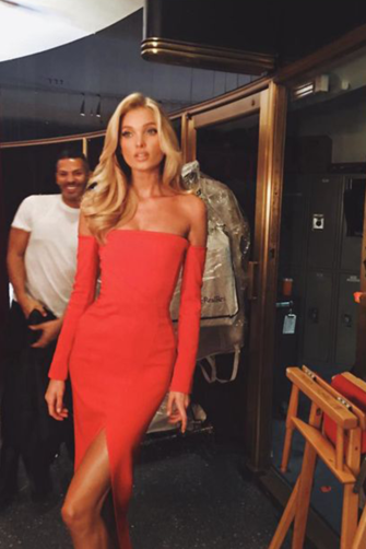 Scarlet Siren – Elsa Hosk Red Off-the-Shoulder Slit Gown