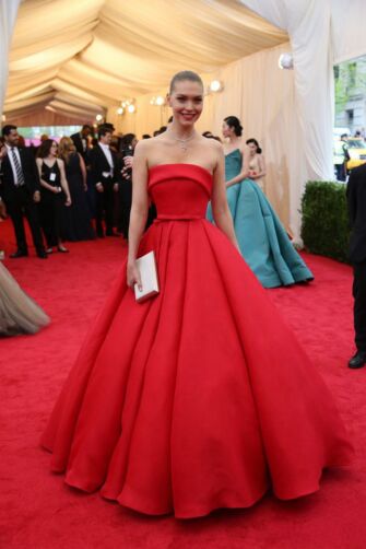 Crimson Couture – Arizona Muse Met Gala-Inspired Strapless Ball Gown with Full Skirt