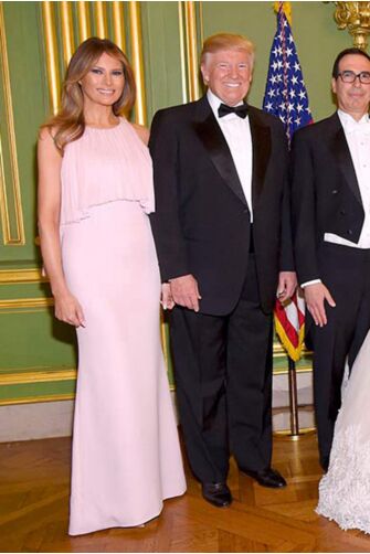 Blush Cascade – Melania Trump Pink Pleated Capelet Gown