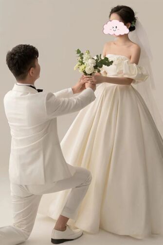 Eternal Grace Off-Shoulder Wedding Gown – Classic Ballgown Silhouette