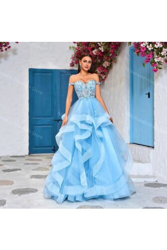 Ethereal Wave – Blue Ruffled Organza Gown with Embroidered Top