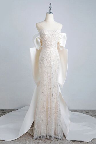 Ivory Beaded Strapless Gown with Satin Bow Detailing – Perfect for Weddings and Luxury Events