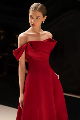 Elegant Off-Shoulder Red Gown with Stylish Draped Bow Detail