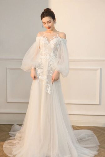  Timeless Off-Shoulder Lace Wedding Dress with Long Sleeves and Elegant Train