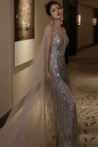 Silver Fringe V-Neck Gown with Tulle Cape – Perfect for Red-Carpet and Gala Evenings
