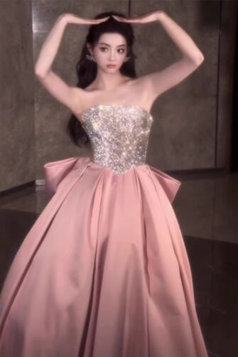 Blush Sequin-Bodice Strapless Ball Gown with Bow – Perfect for Galas and Formal Events