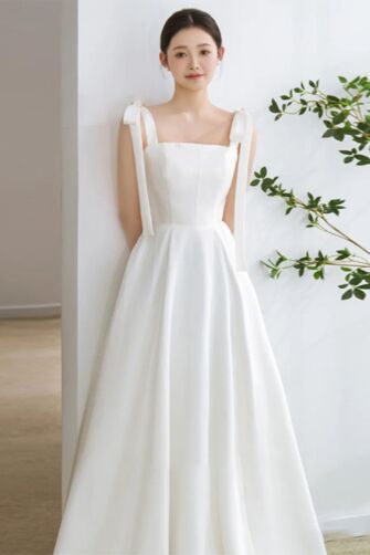 Minimalist White Satin Gown with Bow-Tie Straps – Perfect for Weddings and Elegant Events