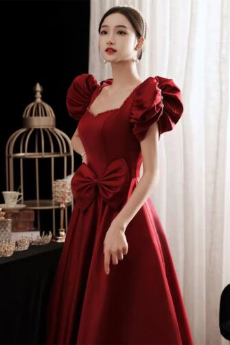Burgundy Puff-Sleeve Bow Gown – Perfect for Weddings and Grand Occasions