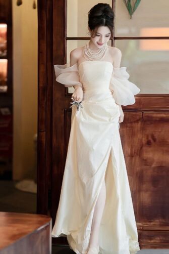 Ivory Off-Shoulder Gown with Sheer Puff Sleeves and High Slit – Perfect for Weddings and Elegant Occasions