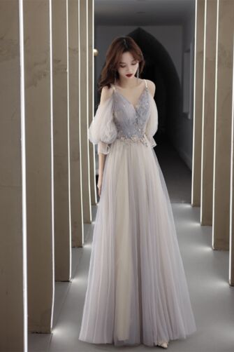 Ethereal Grey Tulle Gown with Puff Sleeves and Delicate Embellishments – Perfect for Evening Galas