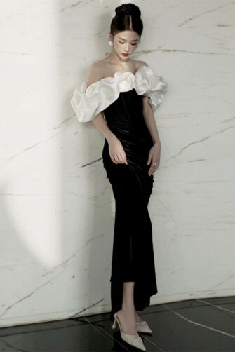 Elegant Black Velvet Gown with Dramatic White Satin Ruffled Shoulders