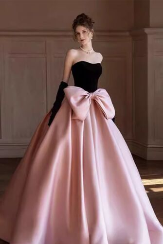Chic Black and Pink Satin Ball Gown with Oversized Bow – Perfect for Formal Galas