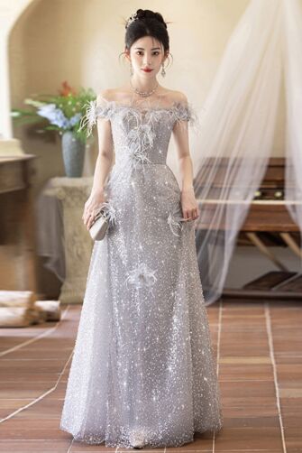 Silver Stardust – Off-Shoulder Sequin Gown with Feathered Accents