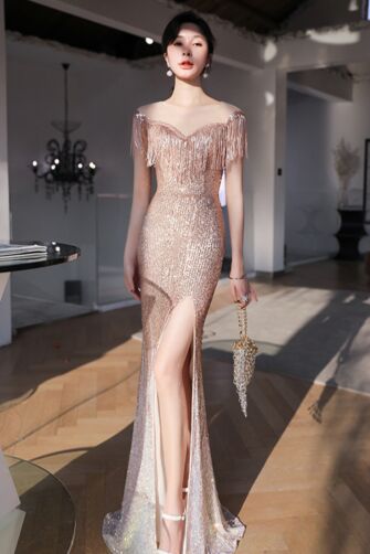 Glistening Rose Gold Sequin Gown with Fringed Shoulder Details and Elegant Side Slit – Perfect for Evening Glamour