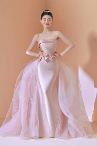 Blush Pink Strapless Gown with Bow and Tulle Overlay – Perfect for Weddings and Formal Events