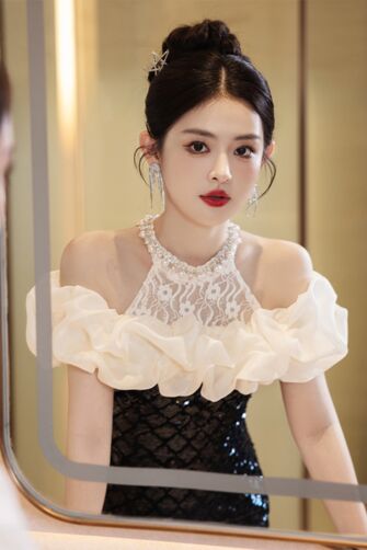 Noir Elegance – Off-Shoulder Sequin Gown with Ruffled Neckline