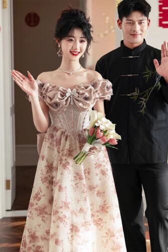 Blush Harmony – Off-Shoulder Floral Jacquard Ball Gown with Ruffled Bow Details