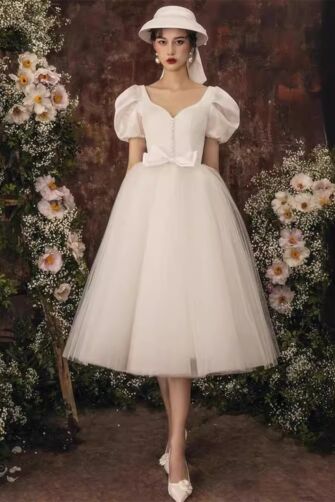 Vintage Blossom Tea-Length Dress – Puff Sleeves & Bow Detail