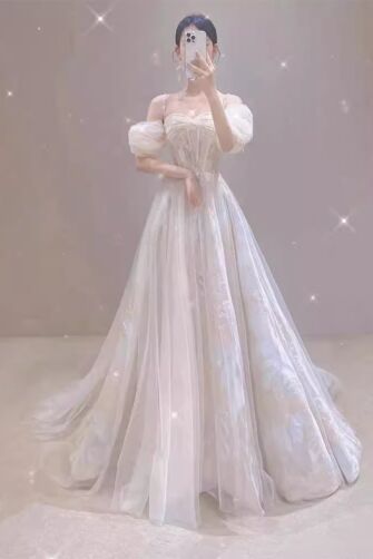 Graceful Off-Shoulder White Tulle Gown with Puffy Sleeves – Ideal for Weddings and Formal Events