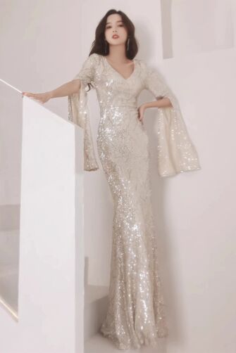 Champagne Sequin V-Neck Gown with Bell Sleeves – Perfect for Evening Events and Gala
