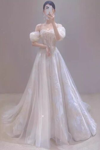 Ivory Off-the-Shoulder Tulle Ball Gown – Perfect for Dreamy Weddings and Grand Occasions