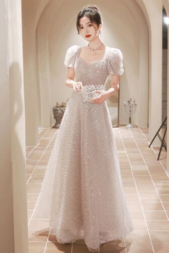 Sparkling Silver Puff-Sleeve Gown with Cinched Waist – Perfect for Weddings and Formal Events