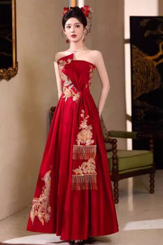 Elegant Red Embroidered Evening Gown with Asymmetrical Design and Fringed Accents