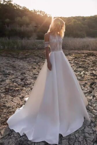 Sleeveless Lace Bodice Ball Gown with Long Train for Formal Events