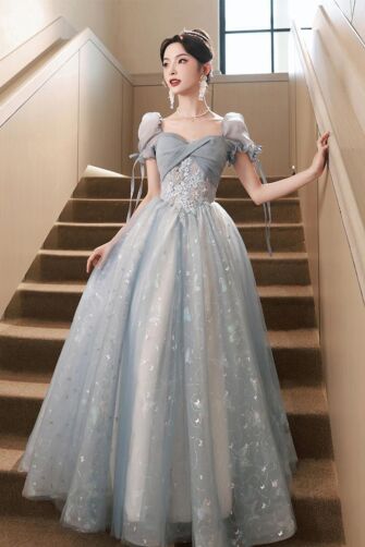 Whimsical Light Blue Tulle Ball Gown with Puff Sleeves and Floral Embroidery – Perfect for Weddings and Formal Galas
