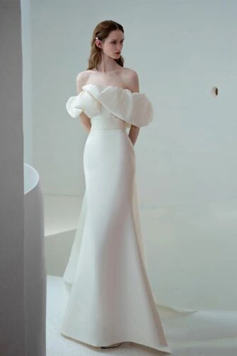 White Sculptural Off-Shoulder Satin Gown – Perfect for Modern Weddings and Elegant Ceremonies