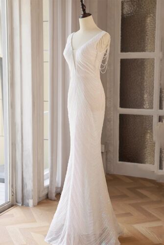 Pearl White Iridescent V-Neck Gown with Shoulder Chains – Perfect for Weddings and Glamorous Evenings